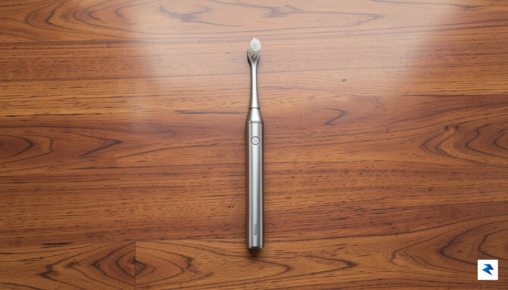 A sleek, top-down studio shot of the Dyson PencilWash resting&hellip;